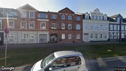 Boligudlejningsejendomme til salg i Odense C - Foto fra Google Street View Boligudlejningsejendomme til salg i Odense C - Foto fra Google Street View